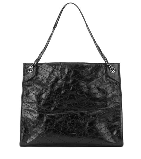 Niki Large leather tote in black .